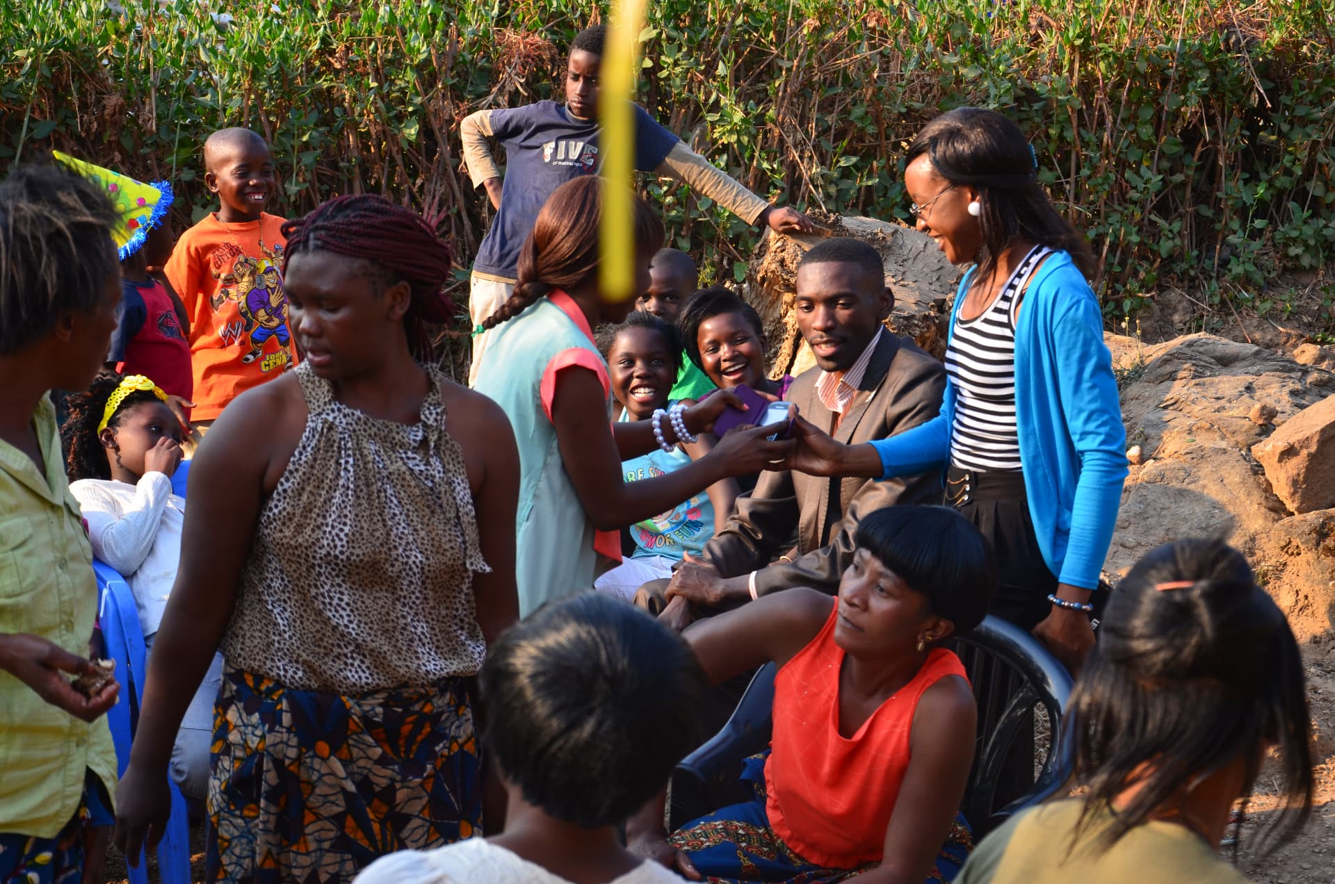 Women and children celebrating together at a community event