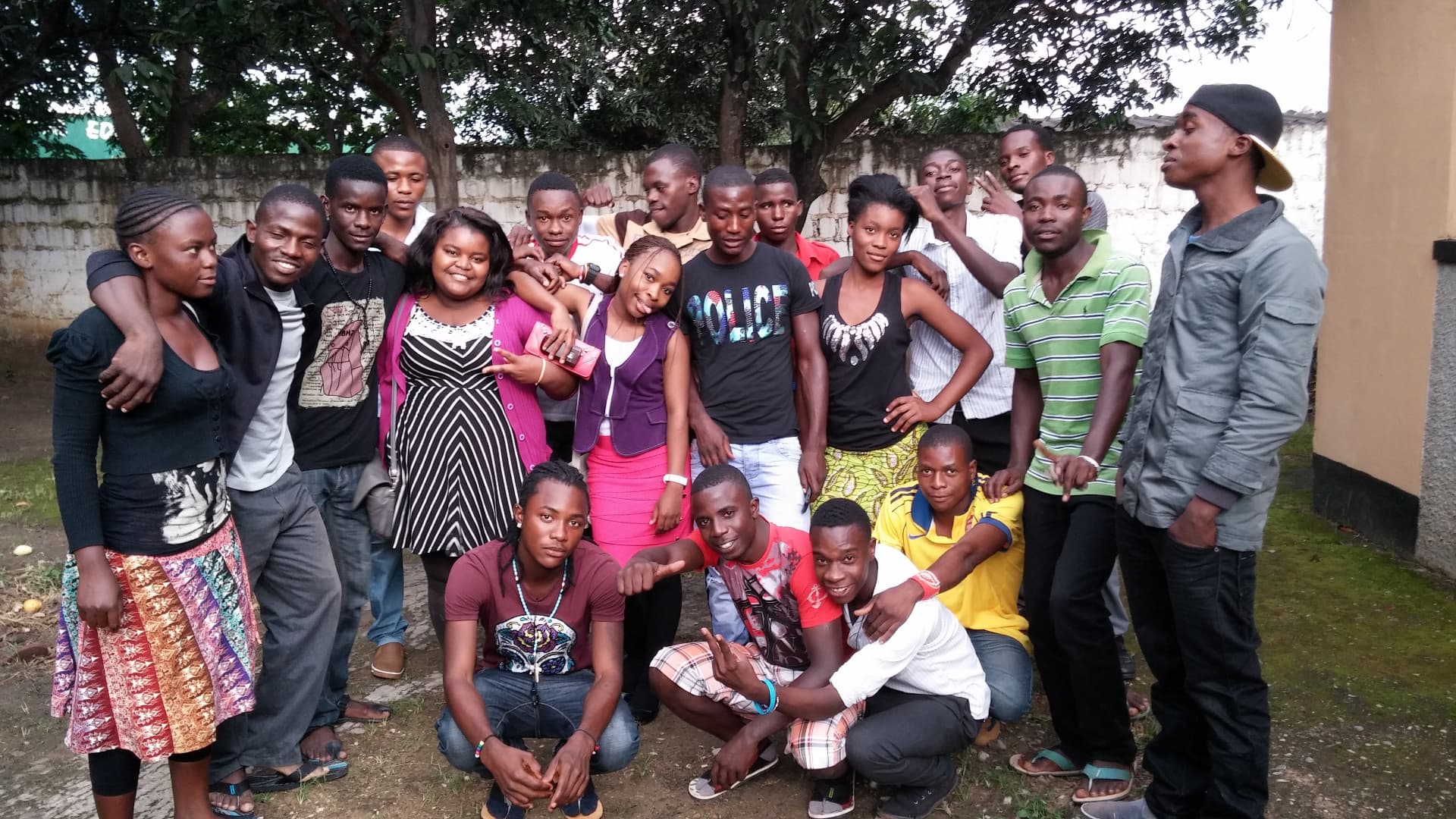Young people from the MCF community posing together outdoors