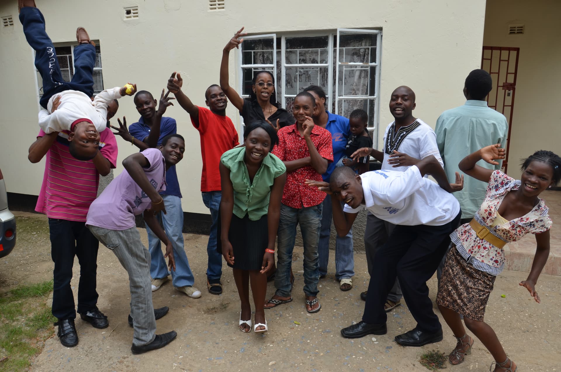 Young people laughing and posing playfully together